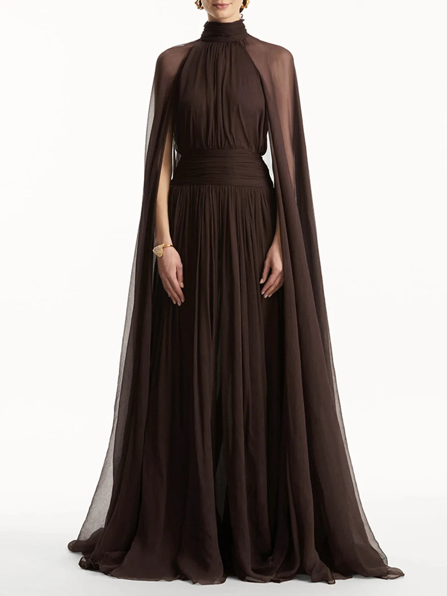 Brown evening gown with cape on a white background