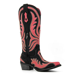 Black and pink cowboy boot with intricate design on a white background