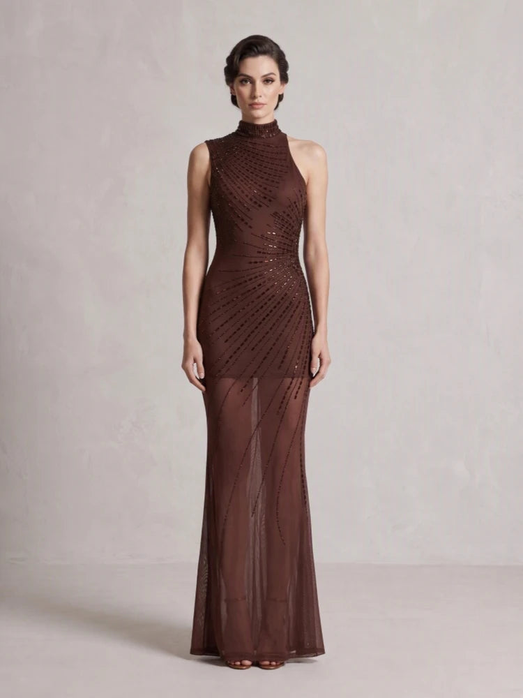 Turtleneck gown with sequin embellishments and sheer fabric