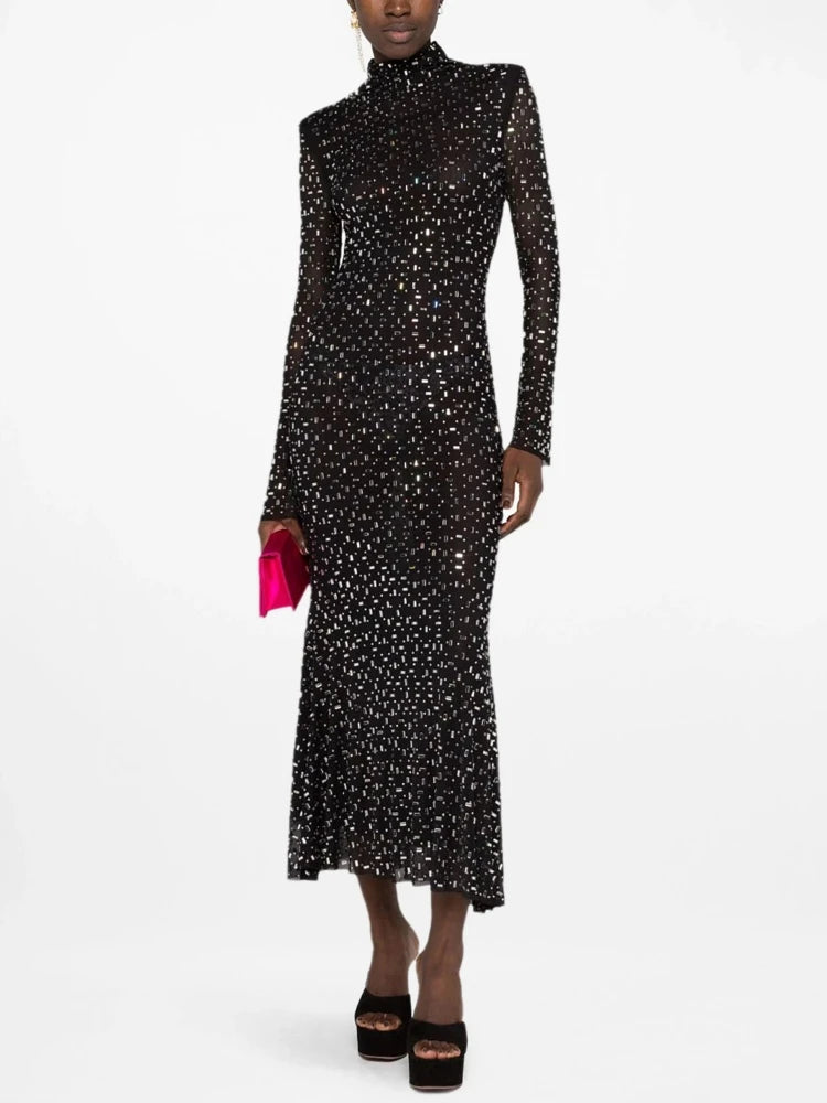 Black turtleneck mesh diamond long sleeve gown.

