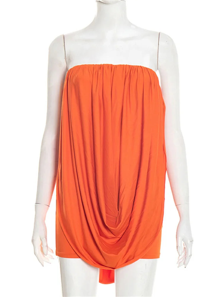 Orange sleeveless dress on a mannequin against a white background