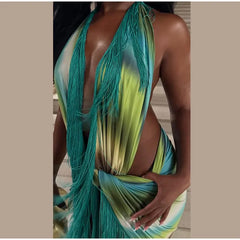 Close-up detail of a printed halter fringe maxi dress