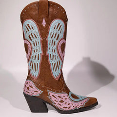 Brown cowboy boot with decorative pink and blue patterns on a white background