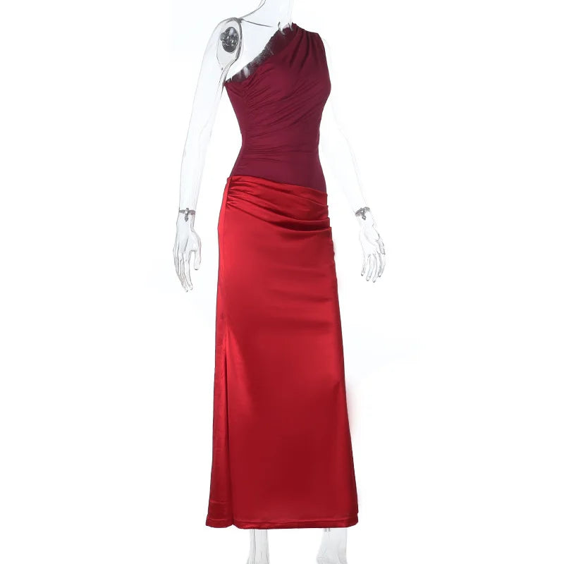 Red evening gown on a white mannequin against a white background