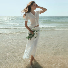 Stylish knitted V-neck short set with hollow-out details.
