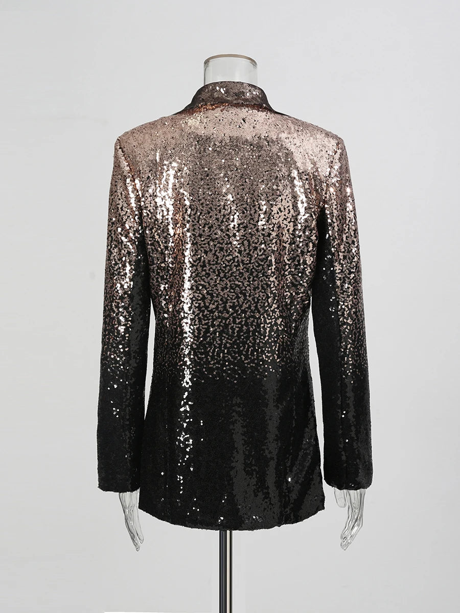 Black and silver sequin jacket on a mannequin against a gray background
