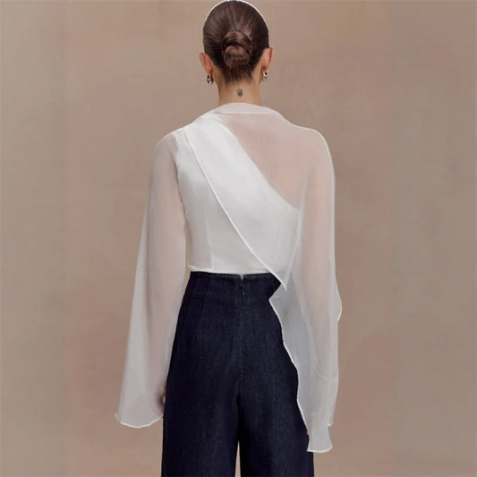 Asymmetrical draped cape sleeve blouse with sheer overlay back view