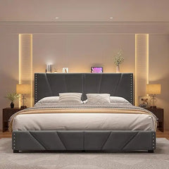 Modern bedroom with a gray upholstered bed and decorative elements.
