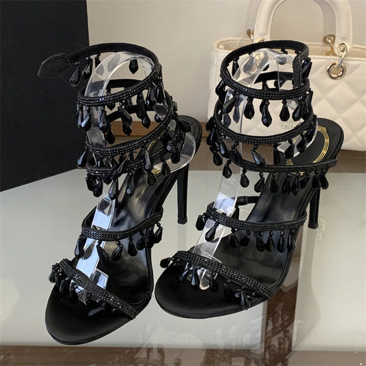 Black crystal ankle strap stiletto heels