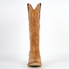 Front view of brown faux leather knee-high boot with pointed toe and embroidery