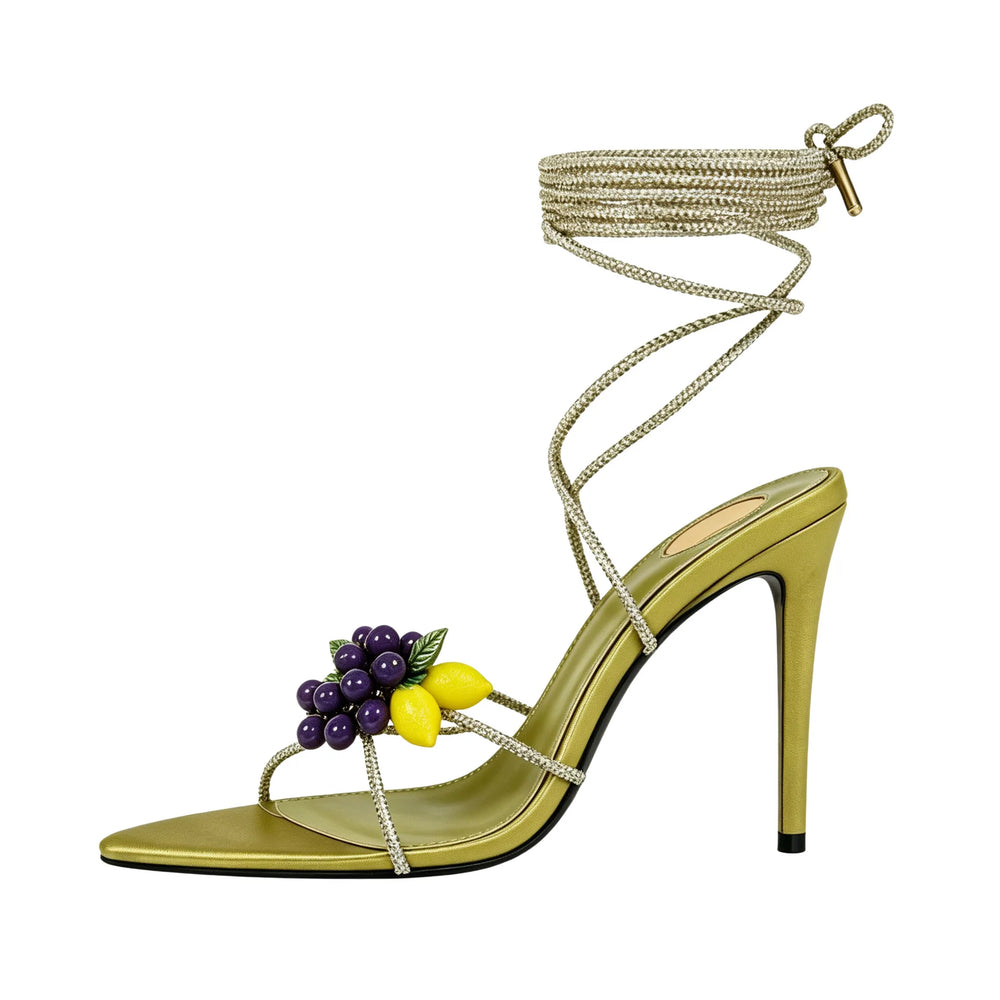 Green stiletto sandal with grape and lemon embellishments and ankle wrap