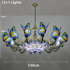 Butterfly-themed chandelier with stained glass design on a gray background
