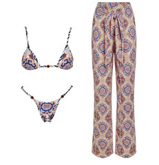 Full view of a patterned two-piece swimwear set including a bikini and wide-leg palazzo pants.