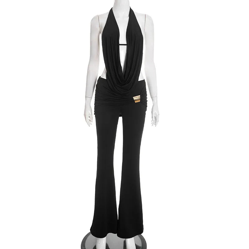 Black evening gown on a mannequin against a white background