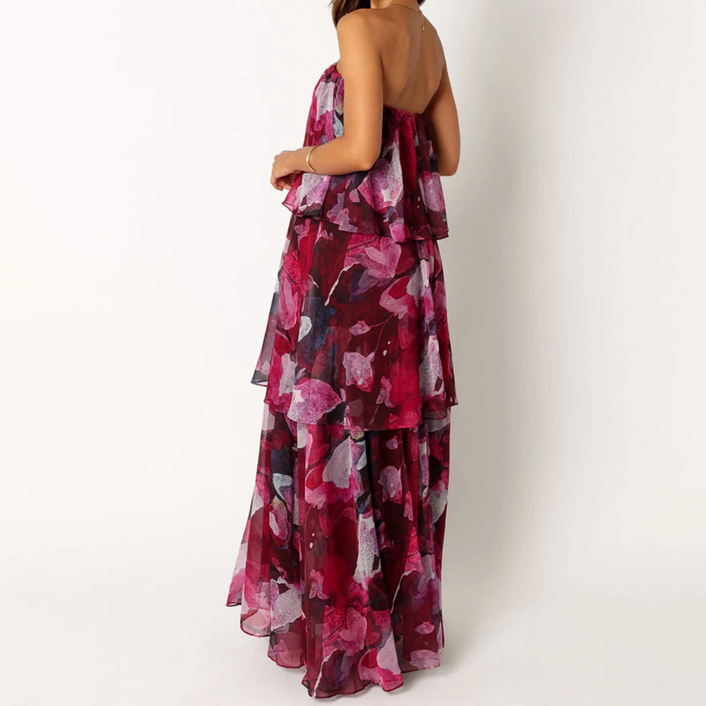 Woman wearing a floral dress with a white background