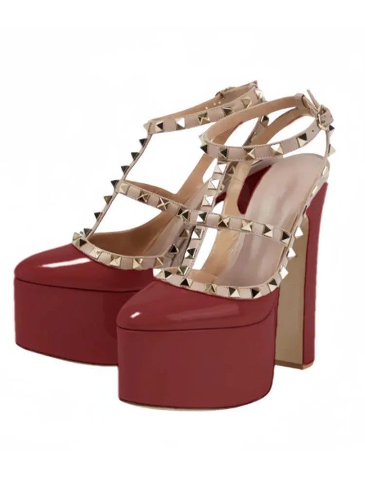 Red platform high heels with gold studded details