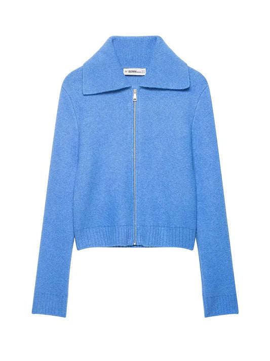 Blue zip-up sweater on a white background