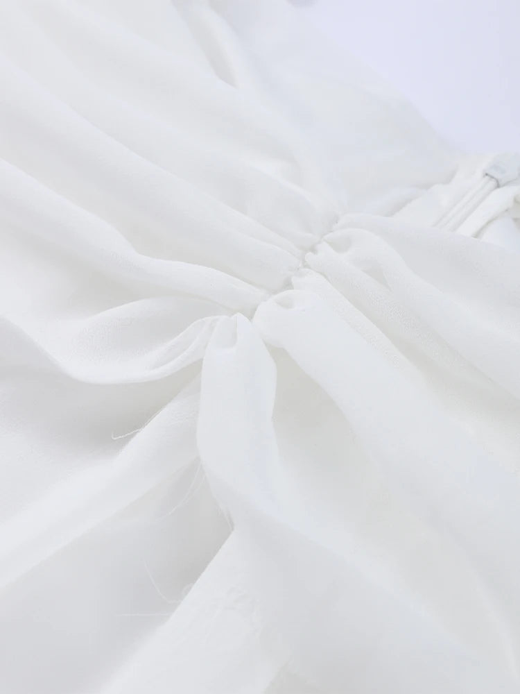 Close-up of white fabric with folds