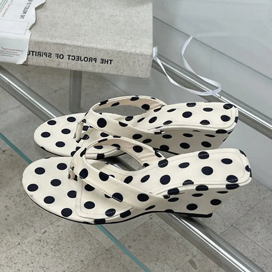 White polka dot wedge flip-flops