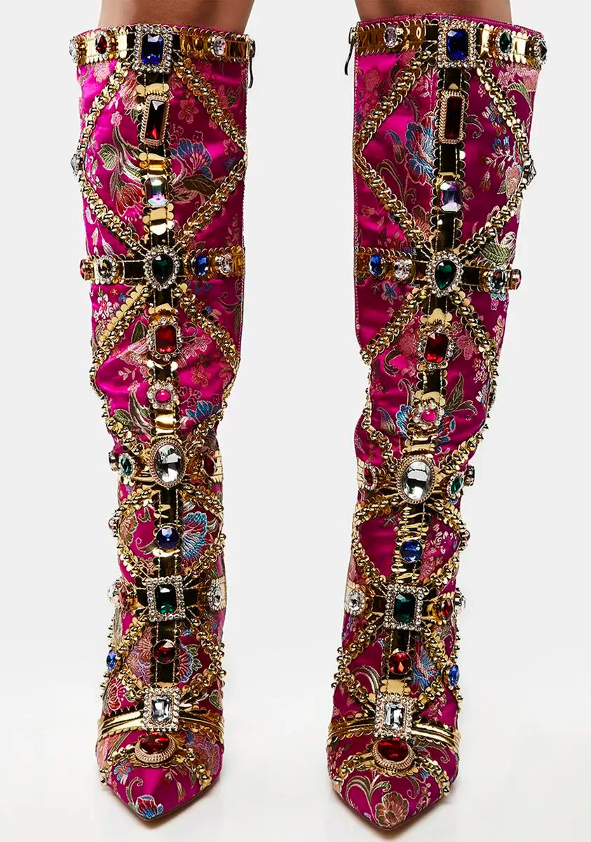 Decorative pink knee-high boots with gemstones