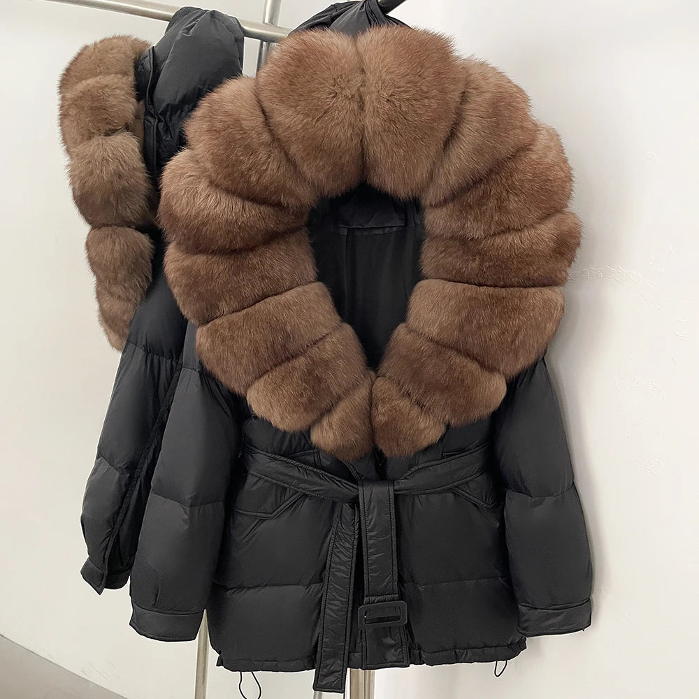 Black puffer jacket with brown fur collar
