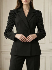 Black double-breasted blazer with beaded tassel detailing on the shoulders