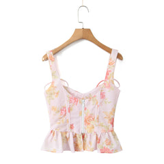 Woman wearing a Ribbon Bow Strap Ruffles Hem Top 