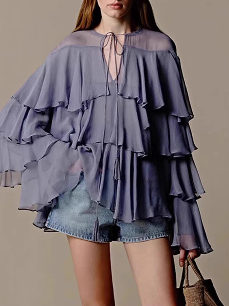 Tiered ruffle long sleeve blouse with a loose-flowing silhouette