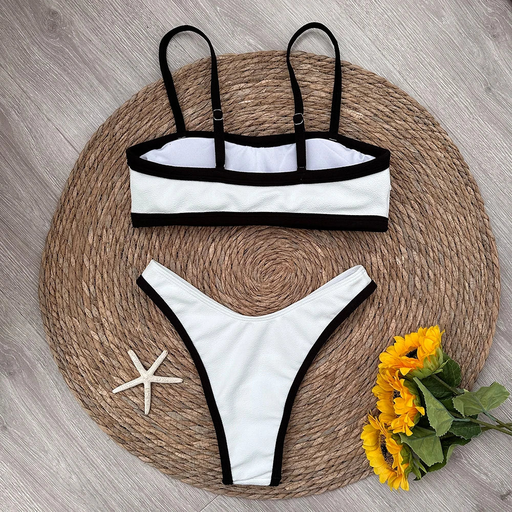 Back view of textured bikini top with black contrast trim.