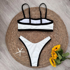 Back view of textured bikini top with black contrast trim.