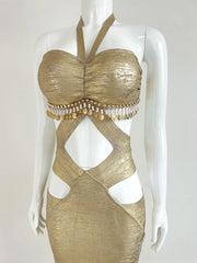 Close-up of gold beaded halter cutout maxi dress bodice