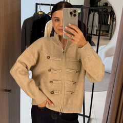 Beige knit jacket with stand collar and double-breasted button detail