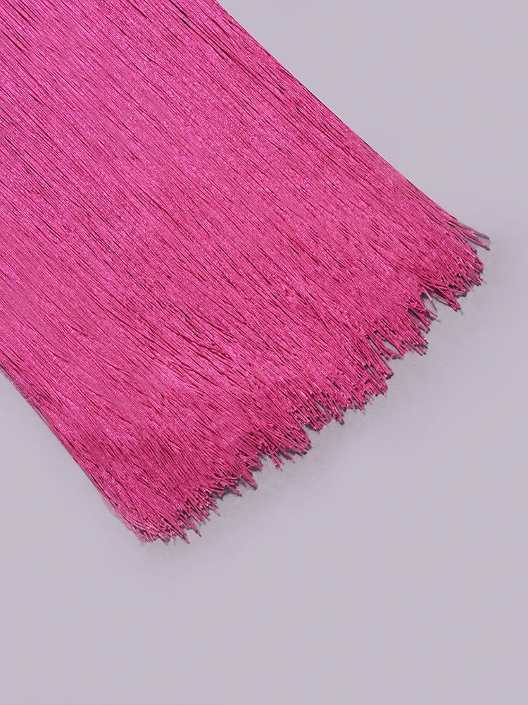 Pink tinsel on a gray background