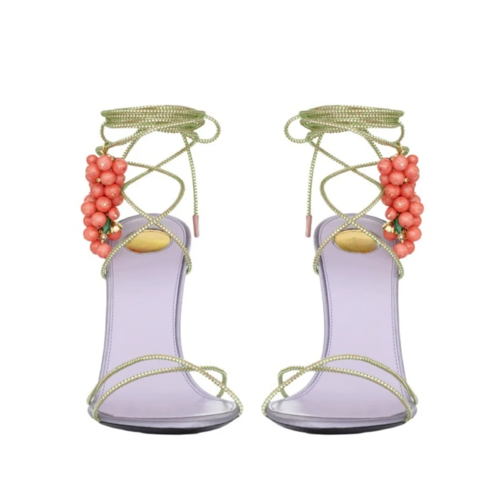 Purple stiletto sandals with coral grape bead embellishments and ankle wrap straps