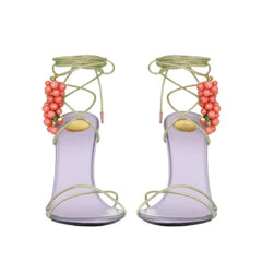 Purple stiletto sandals with coral grape bead embellishments and ankle wrap straps