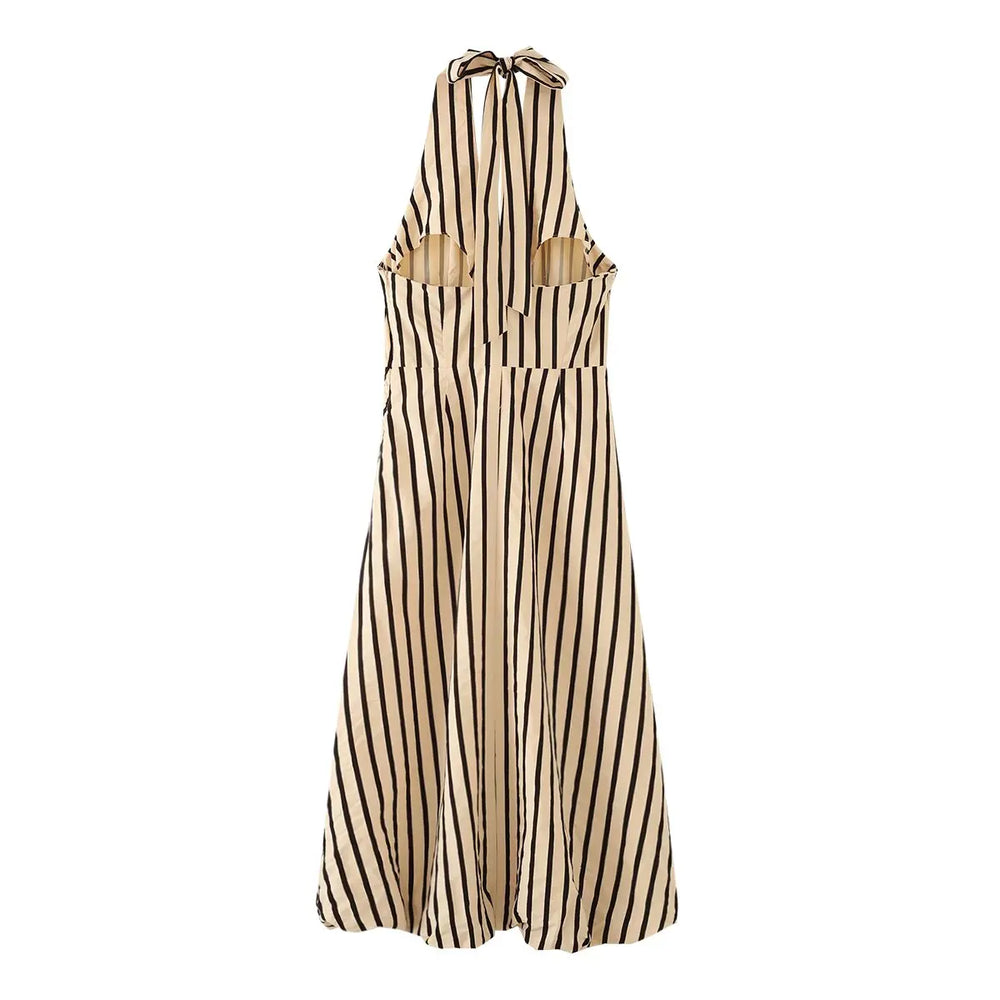Striped halter neck midi dress worn by a model showing back