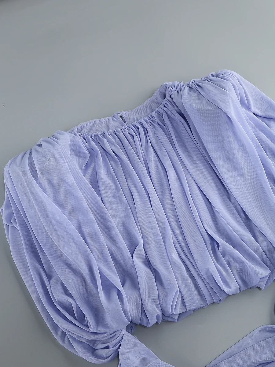 Light purple lace shorts on a gray background