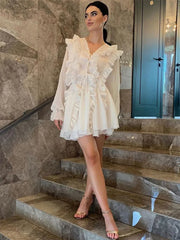 Ruffled lace-up mini dress on stairs