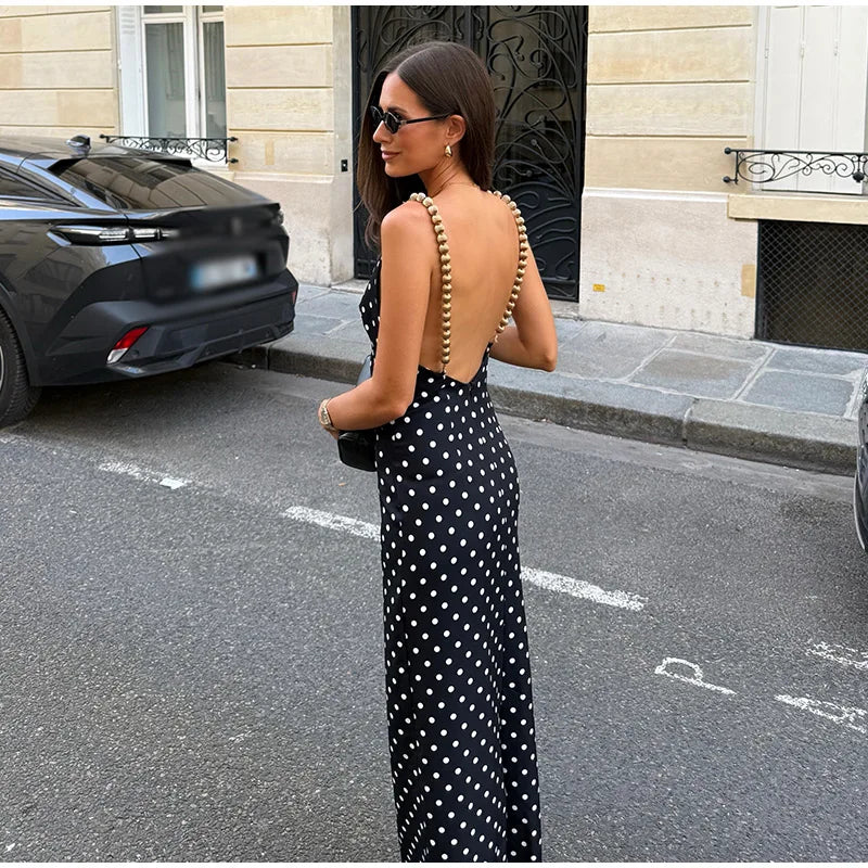 Polka dot print maxi dress with beaded shoulder straps and open back.