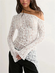 White lace off-shoulder top worn by a person on a white background