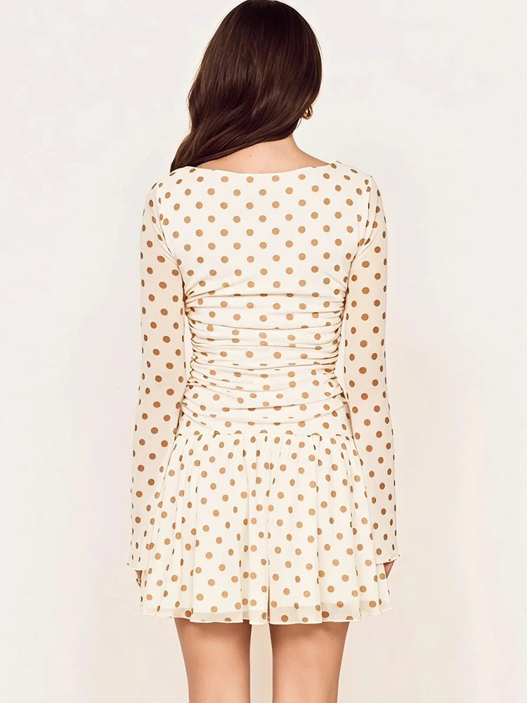 Polka dot ruched mini dress back view