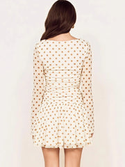Polka dot ruched mini dress back view