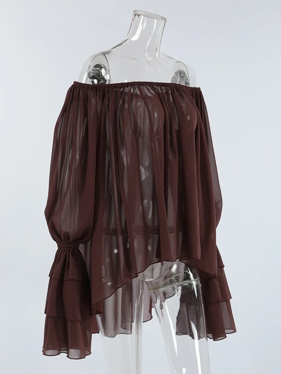 Brown off-shoulder sheer blouse on a clear mannequin 