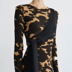 Leopard print dress with a black drape