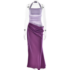 Mannequin wearing a purple dress with a white background