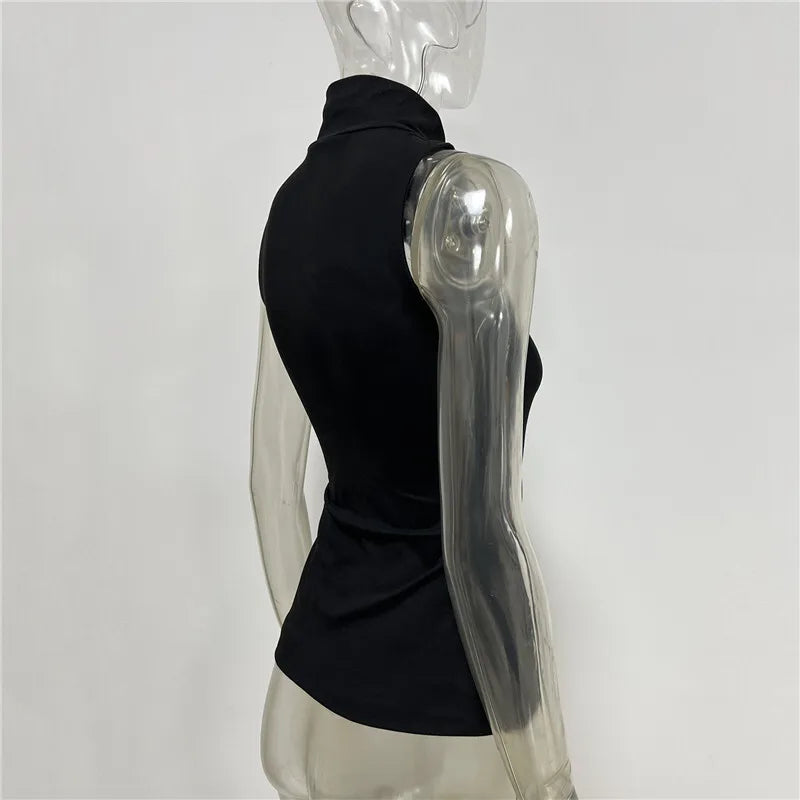 Clear plastic arm prosthesis on a mannequin with a black sleeve against a white background
