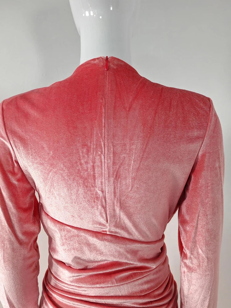 Pink velvet dress on a mannequin 