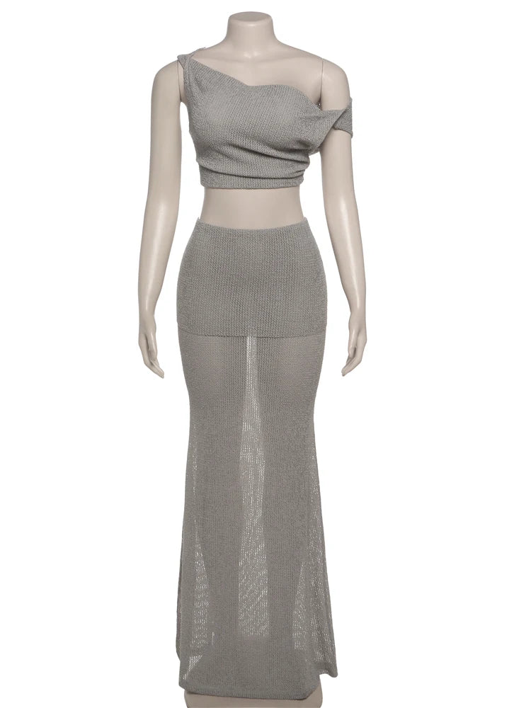 Mannequin wearing a gray two-piece outfit on a white background