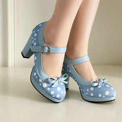 Blue polka dot Mary Jane platform heels with ankle strap and bow