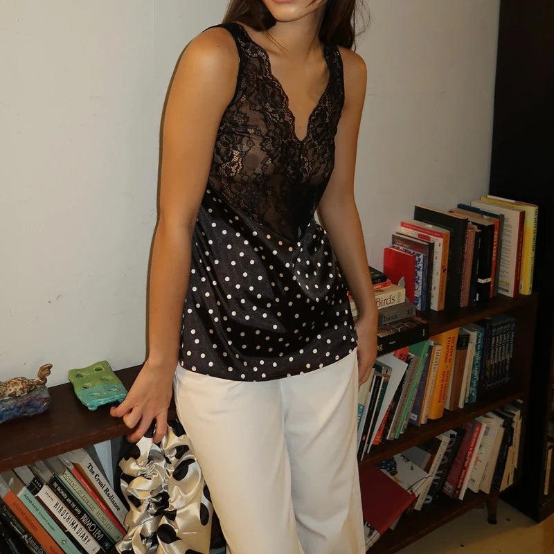Sleeveless V-neck lace bodice polka dot satin peplum tank top side view